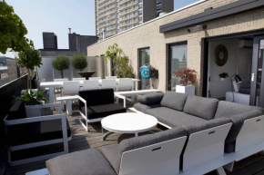 Modern appartement centrum Oostende met enorm dakterras (parking beschikbaar)